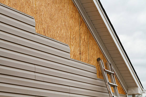 Professional Storm Damage Siding Repair technician working in Duncannon, PA